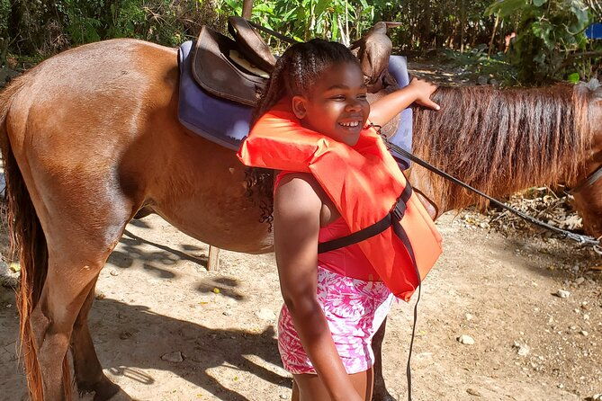 dunns-river-falls-climb-zipline-and-horseback-riding-private-tour