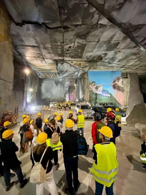 E-Bike Tour to the Carrara Marble Quarries with lard tasting - Descending into Carrara & Architectural Highlights