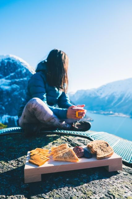 enjoy-a-cliff-picnic-in-the-fjord-landscape-of-norway