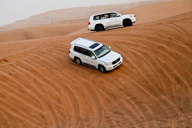Evening Desert Safari Tour With Live Enterterment And BBQ Dinner - Unique Experiences