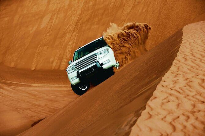 Evening Desert Safari with Belly Dance and BBQ Dinner and Camel Ride - Key Points