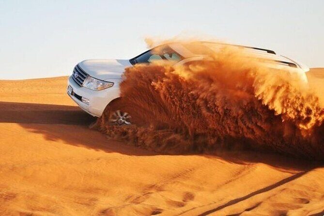 Evening Desert Safari with Quad Bike Experience, BBQ Dinner & Live Shows - Key Points