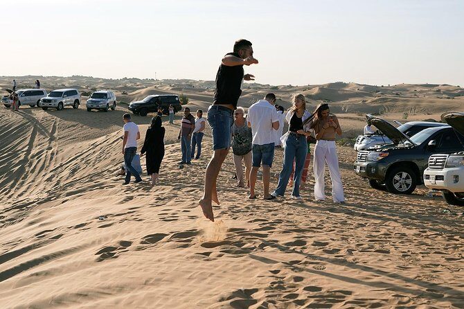 Exclusive Sunrise Desert Safari with Camel Ride Sand Boarding Dune Bashing - The Experience in Detail