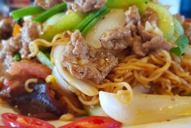 Exploring Hue Food Tour with Local Guide - Second Stop: Bun Hen with Scenic Views