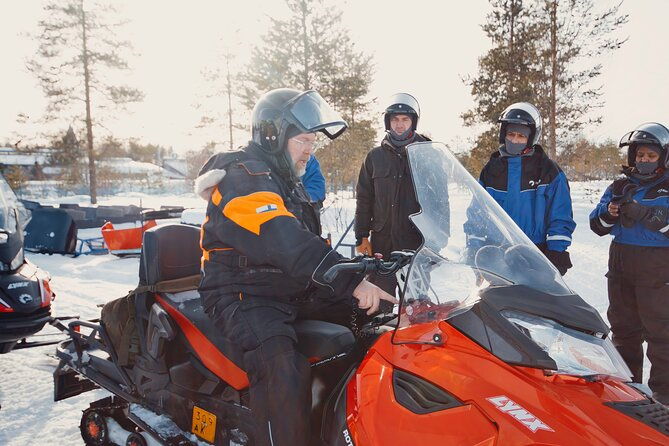 family-snowmobile-safari-from-santa-claus-village
