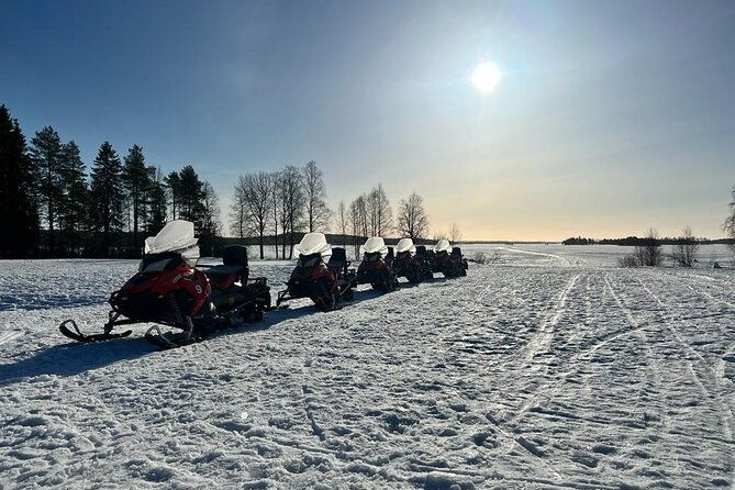 family-snowmobiling-in-rovaniemi-apukka-resort