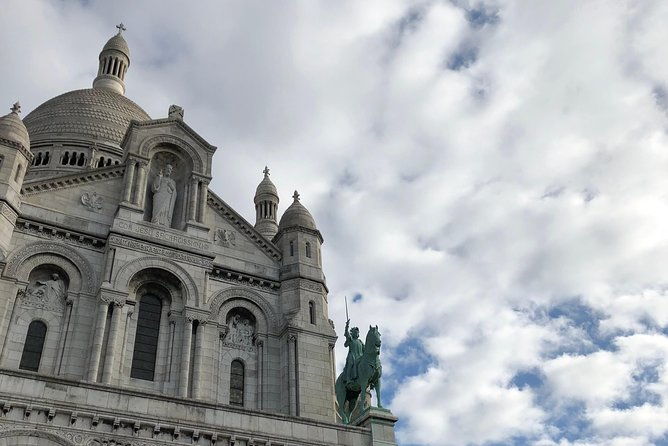 fat-cat-gets-the-early-bird-montmartre