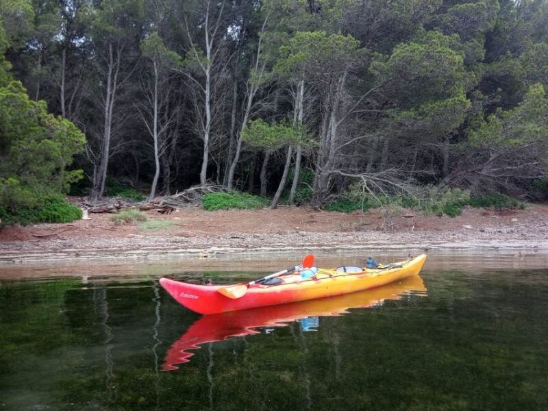 fornells-bay-sunset-kayak-tour-from-ses-salines-menorca