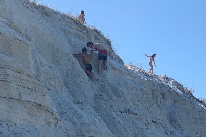 frisky-mermaid-dolphin-tour-secluded-beach-equip