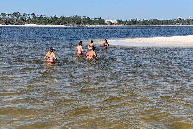 frisky-mermaid-dolphin-tour-secluded-beach-equip