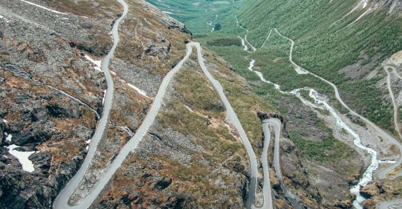 from-alesund-trollstigen-sightseeing-village-fjord-tour