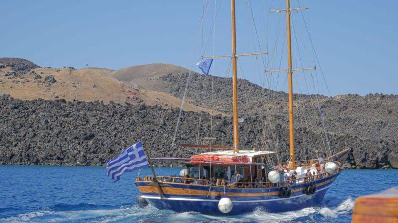 from-fira-volcanic-islands-boat-trip-with-hot-spring-visit