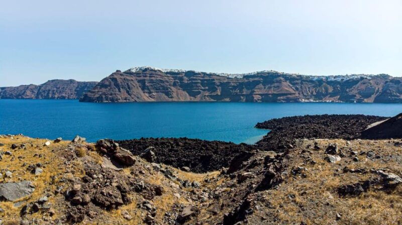 from-fira-volcanic-islands-boat-trip-with-hot-spring-visit