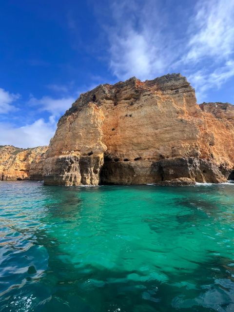 from-lagoa-dolphins-ponta-da-piedade-with-biologist-guide
