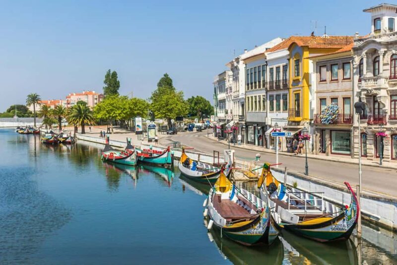 From Lisbon: Aveiro, Boat Ride, Costa Nova & Coimbra Private - Key Points