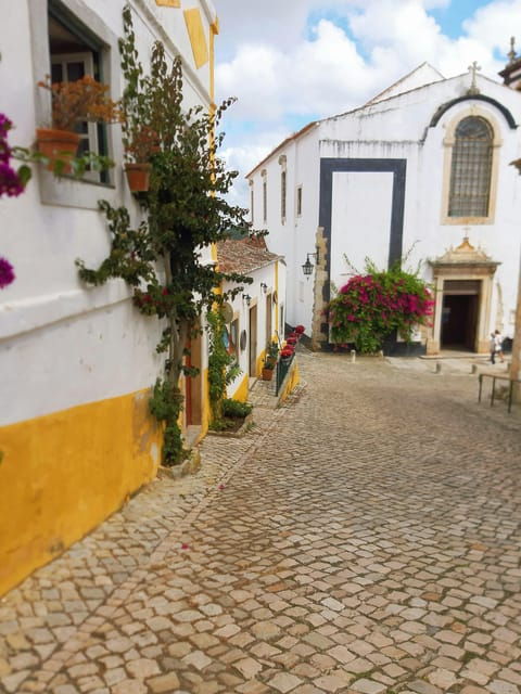 from-lisbon-private-tour-to-obidos-nazare-fatima-batalha-and-alcobaca