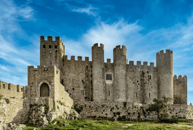 From Lisbon: Tour to Óbidos and Nazaré - Medieval Village, Ginja, and Surf Museum - Exploring Óbidos: Portugal’s Medieval Treasure