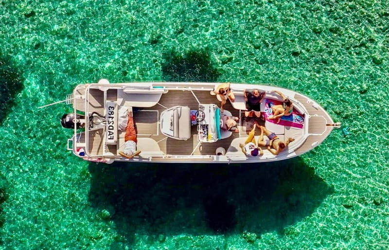 From Marseille: Iconic Calanques Boat Tour with Swimming - The Essence of the Calanques Boat Tour  