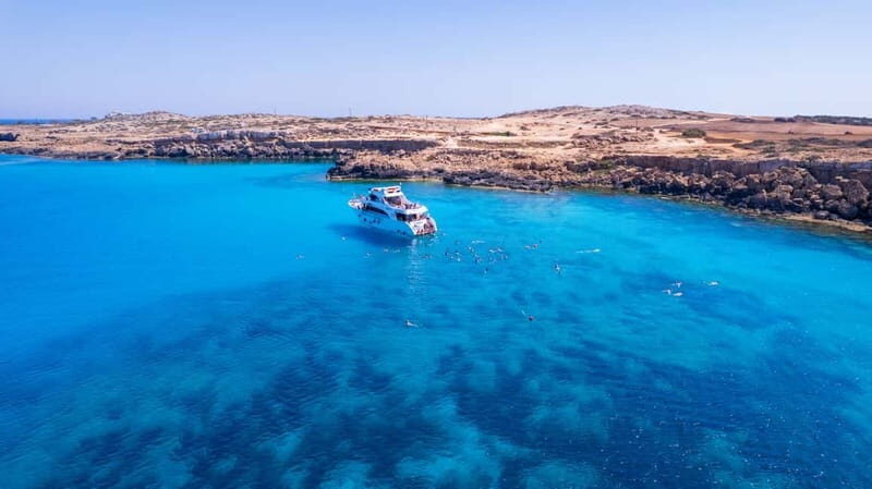 From Paphos: Akamas Blue Lagoon Cruise with Water Slide - Key Points