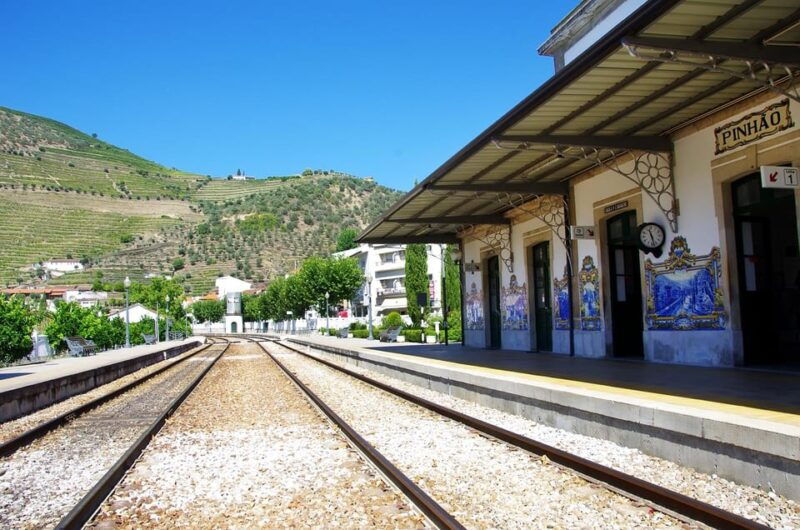 from-porto-wine-tasting-with-lunch-on-a-farm-traditional-boat-and-train