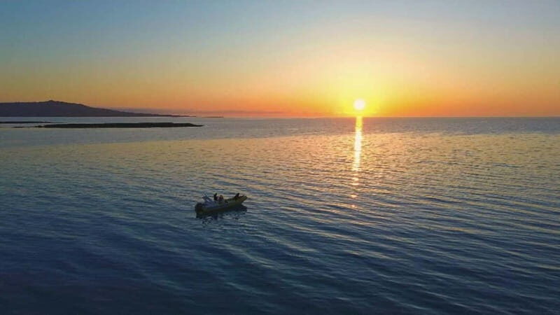 From Stintino: two-hour dinghy tour at sunrise or sunset - The Sum Up