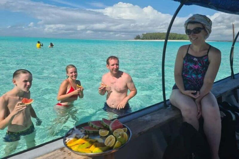 From Stone Town: Mnemba Dolphins & Snorkeling with Lunch - The Sum Up