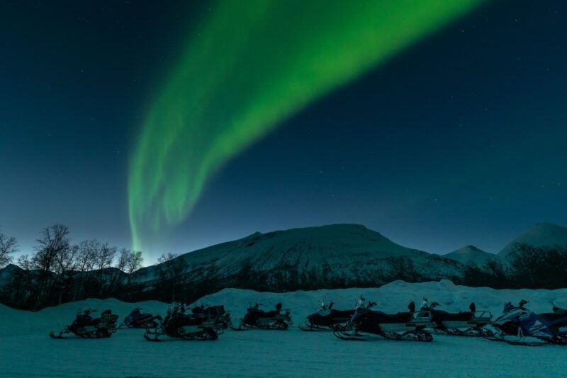 from-tromso-evening-snowmobiling-tour-at-camp-tamok