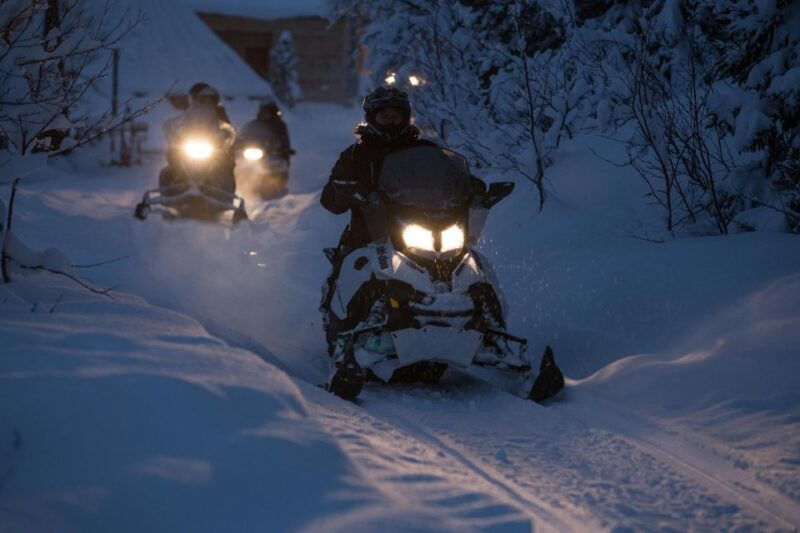 from-tromso-evening-snowmobiling-tour-at-camp-tamok