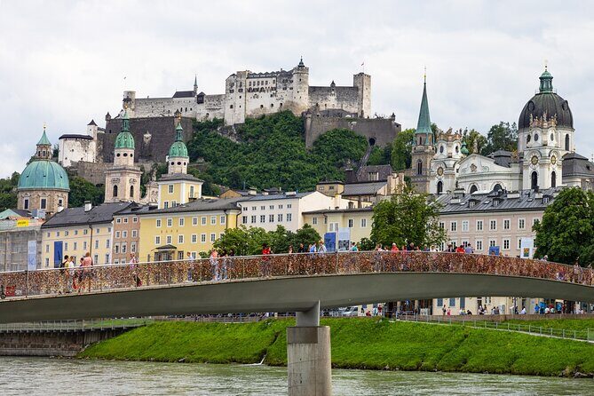 From Vienna: Day Tour to Hallstatt and Salzburg with Boat Ride - Exploring the Itinerary in Detail