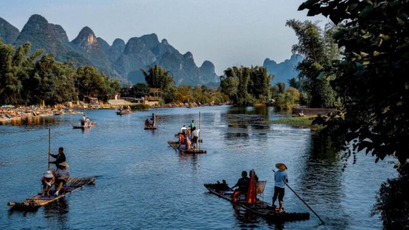 From Yangshuo: Yulong River bamboo raft Ruyi Peak Day Tour - Exploring the Itinerary in Detail