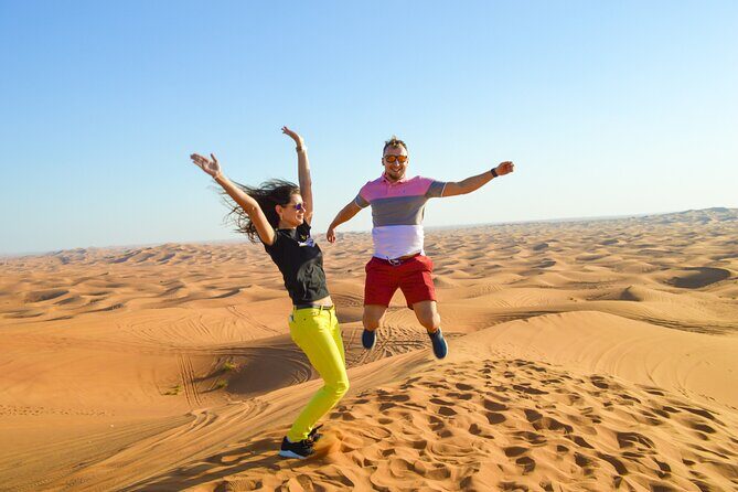 Full-Day Guided Red Dunes Desert Tour in Dubai with Camel Ride - The Sum Up