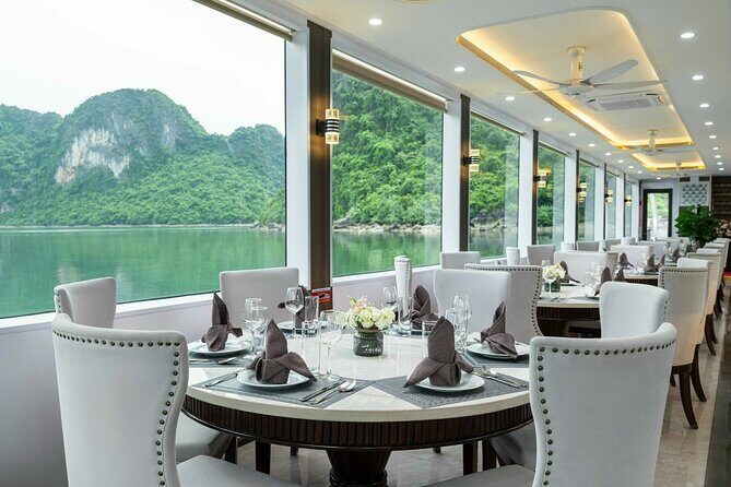 Full day Halong Bay Luxury Cruise - buffet lunch, kayak, swim. - Kayaking at Luon Cave: Quiet Waters and Scenic Cliffs