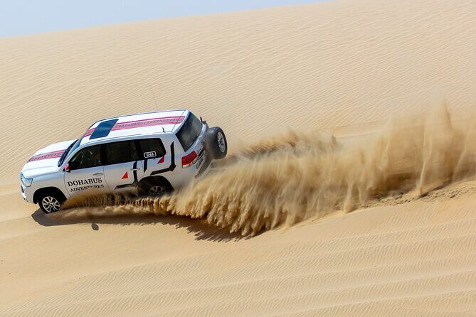Full-day Qatar desert safari: dune bashing, sandboarding, camels - Key Points