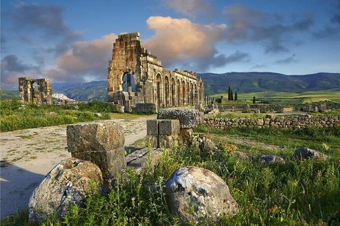 Full-Day Tour with a Group to Volubilis Moulay Idriss Meknes from Fez - Stop 2: The Roman Ruins of Volubilis