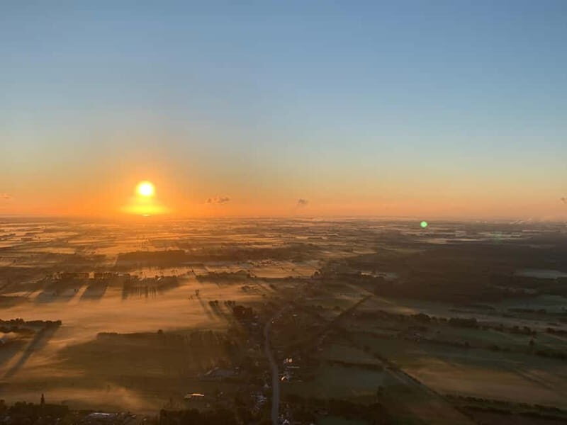 Ghent: Sunrise Hot Air Balloon Tour - Included Amenities and Extras