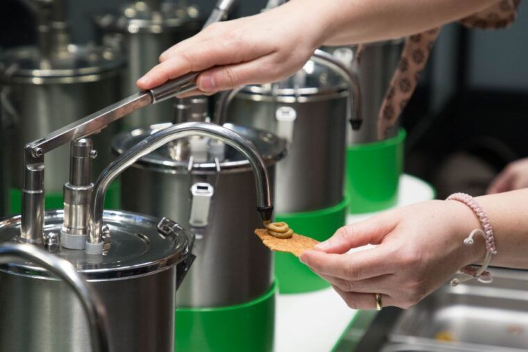 gouda-syrup-waffle-factory-ticket-with-a-waffle