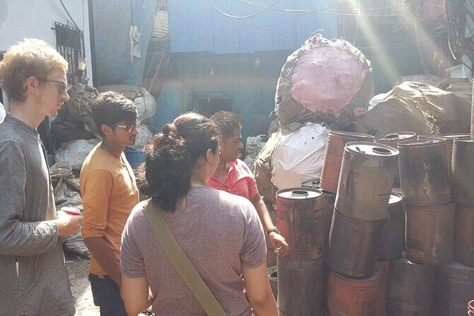Group Tour of Dharavi Slum walk with local Guide - Key Points