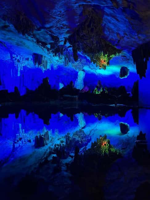 Guilin Local Life & Scenic Wonders: Full-Day in-depth city - Reed Flute Cave: A Kaleidoscope of Light and Color