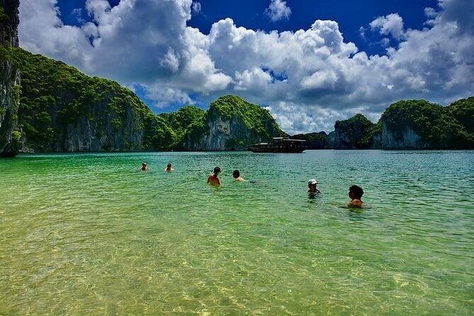 Ha Long Bay Day Cruise, Cave, Kayaking, Swimming, Bus & Lunch - The Sunset Party: Relaxation and Indulgence