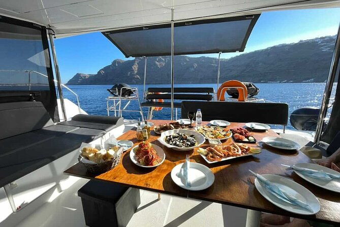 half-day-premium-catamaran-cruise-in-santorini-including-oia