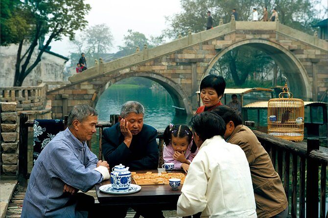 Half Day Private Tour to Wuzhen Water Town with Boat Ride from Hangzhou - Key Points