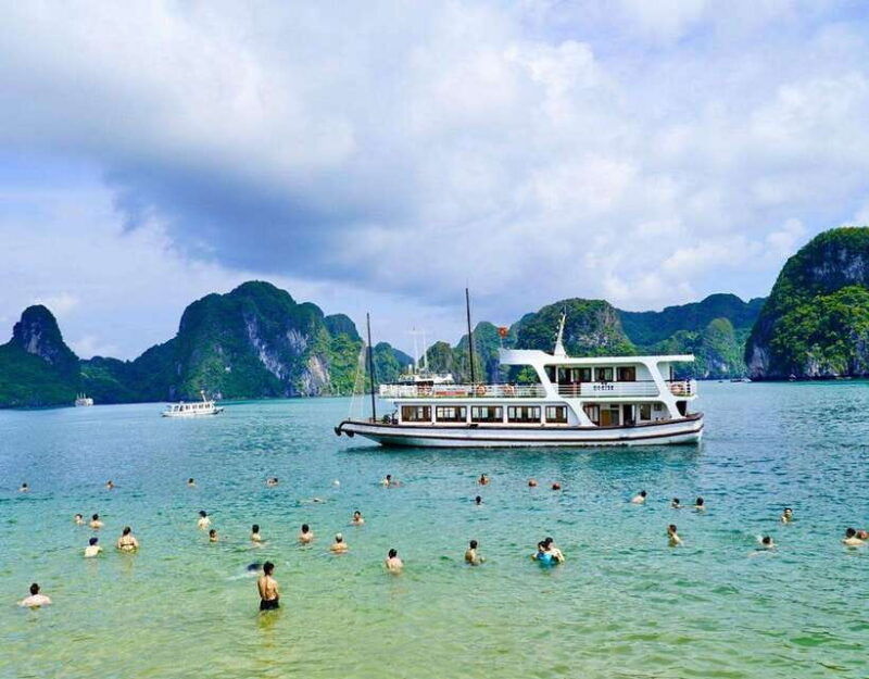 halong-bay-day-trip-surprise-cave-titop-island-kayaking