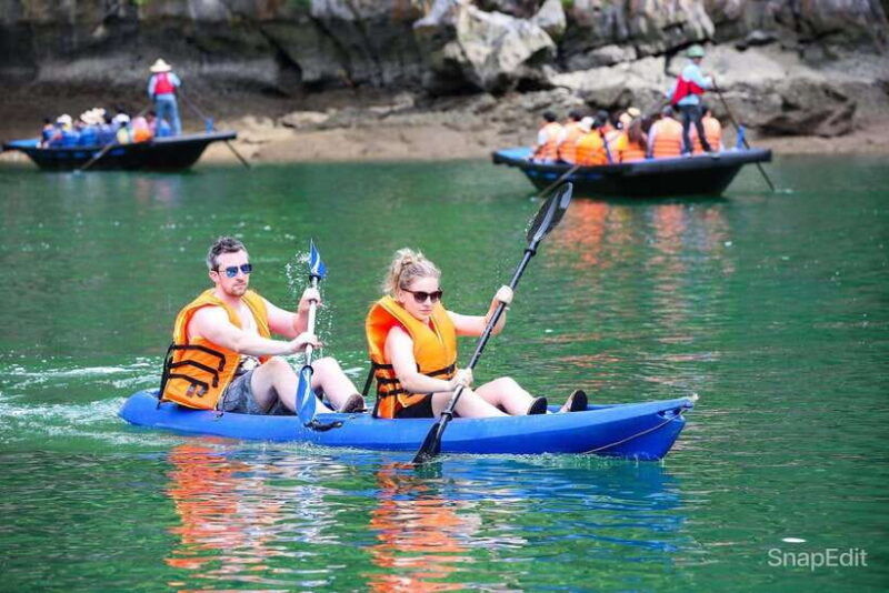 halong-bay-day-trip-surprise-cave-titop-island-kayaking