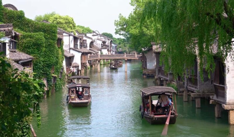 Hangzhou: Wuzhen & Nanxun Town Tour with Tea & Pingtan - Key Points