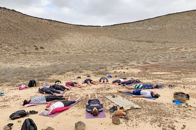 hatha-yoga-in-front-of-the-ocean-and-inside-the-volcano
