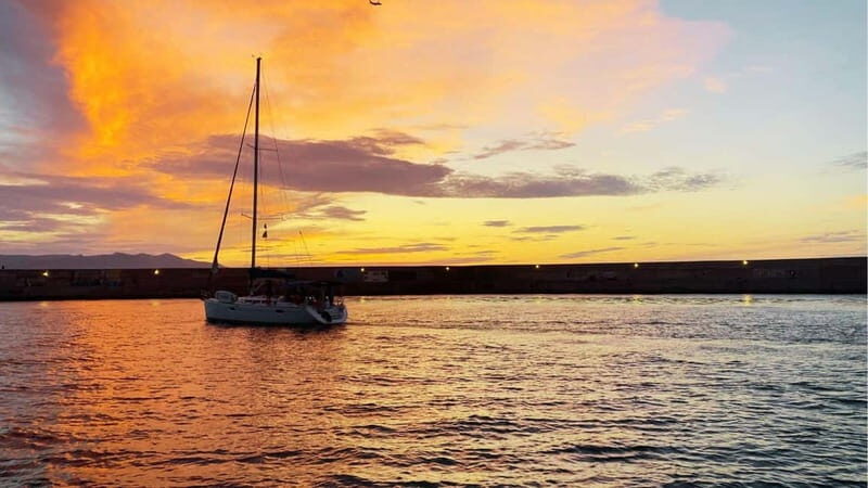 Heraklion: Dia Island Sunset Boat Tour with Dinner - The Sum Up