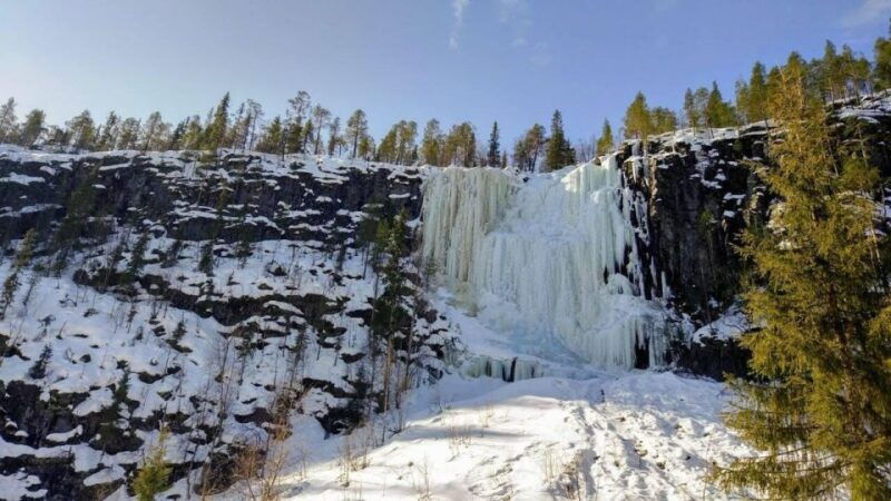 hiking-at-korouoma-frozen-waterfall