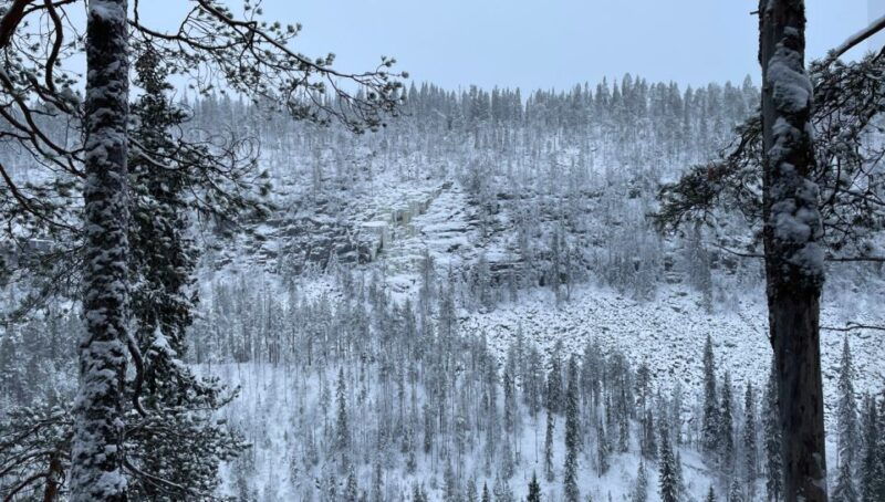 hiking-at-korouoma-frozen-waterfall