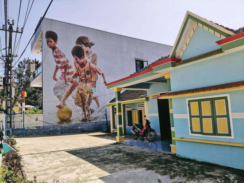 hoi-an-car-to-tam-thanh-mural-village-mother-thu-monument