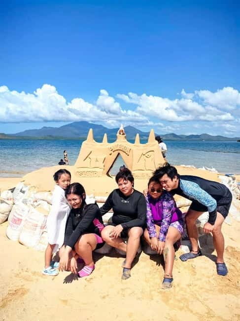 Honda Bay Island Hopping Tour A Perfect Day in Paradise - Cowrie Island: The Tourist Haven with a Filipino Feast